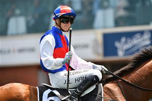 MELBOURNE, AUSTRALIA - JANUARY 30: Jamie Kah after riding Aussie Nugget to win Race 2, the Quayclean Handicap, during Melbourne Racing at Flemington Racecourse on January 30, 2021 in Melbourne, Australia. (Photo by Vince Caligiuri/Getty Images)