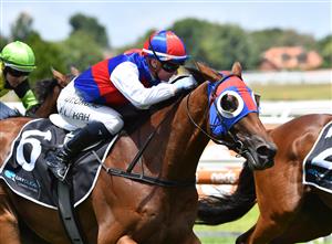 MELBOURNE, AUSTRALIA - JANUARY 30: Jamie Kah riding Aussie Nugget to win Race 2, the Quayclean Handicap, during Melbourne Racing at Flemington Racecourse on January 30, 2021 in Melbourne, Australia. (Photo by Vince Caligiuri/Getty Images)