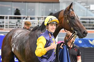 MELBOURNE, AUSTRALIA - JANUARY 30: Jordan Childs after riding Vespertine to win Race 1, the Ive Print Handicap during Melbourne Racing at Caulfield Racecourse on January 30, 2021 in Melbourne, Australia. (Photo by Vince Caligiuri/Getty Images)