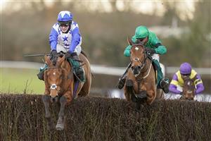 WARWICK, ENGLAND - FEBRUARY 03: Jonjo O'Neill Jr. riding Annie Mc (blue) clear the last to win The Lady Protectress Mares' Chase at Warwick Racecourse on February 03, 2021 in Warwick, England. Due to the Coronavirus pandemic, owners along with the paying public will not be allowed to attend the meeting. (Photo by Alan Crowhurst/Getty Images)
