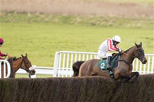 WARWICK, ENGLAND - FEBRUARY 03: Bridget Andrews riding Latenightpass clear the last to win The Willoughby De Broke Open Hunters' Chase at Warwick Racecourse on February 03, 2021 in Warwick, England. Due to the Coronavirus pandemic, owners along with the paying public will not be allowed to attend the meeting. (Photo by Alan Crowhurst/Getty Images)