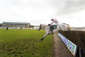 WARWICK, ENGLAND - FEBRUARY 03: Ben Jones riding Volcano clear the last to win The Watch On Racing TV Handicap Chase at Warwick Racecourse on February 03, 2021 in Warwick, England. Due to the Coronavirus pandemic, owners along with the paying public will not be allowed to attend the meeting. (Photo by Alan Crowhurst/Getty Images)