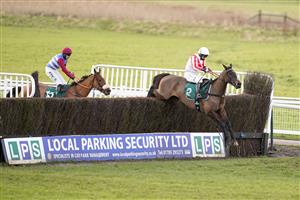 WARWICK, ENGLAND - FEBRUARY 03: Bridget Andrews riding Latenightpass clear the last to win The Willoughby De Broke Open Hunters' Chase at Warwick Racecourse on February 03, 2021 in Warwick, England. Due to the Coronavirus pandemic, owners along with the paying public will not be allowed to attend the meeting. (Photo by Alan Crowhurst/Getty Images)