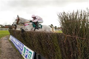 WARWICK, ENGLAND - FEBRUARY 03: Ben Jones riding Volcano clear the last to win The Watch On Racing TV Handicap Chase at Warwick Racecourse on February 03, 2021 in Warwick, England. Due to the Coronavirus pandemic, owners along with the paying public will not be allowed to attend the meeting. (Photo by Alan Crowhurst/Getty Images)