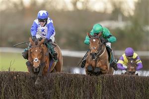 WARWICK, ENGLAND - FEBRUARY 03: Jonjo O'Neill Jr. riding Annie Mc (blue) clear the last to win The Lady Protectress Mares' Chase at Warwick Racecourse on February 03, 2021 in Warwick, England. Due to the Coronavirus pandemic, owners along with the paying public will not be allowed to attend the meeting. (Photo by Alan Crowhurst/Getty Images)