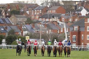 WARWICK, ENGLAND - FEBRUARY 03: A general view as runners line up for the Visit racingtv.com Handicap Hurdle at Warwick Racecourse on February 03, 2021 in Warwick, England. Due to the Coronavirus pandemic, owners along with the paying public will not be allowed to attend the meeting. (Photo by Alan Crowhurst/Getty Images)