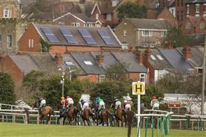 WARWICK, ENGLAND - FEBRUARY 03: A general view as runners take the bend after the straight in The Join Racing TV Now Juvenile Hurdle at Warwick Racecourse on February 03, 2021 in Warwick, England. Due to the Coronavirus pandemic, owners along with the paying public will not be allowed to attend the meeting. (Photo by Alan Crowhurst/Getty Images)
