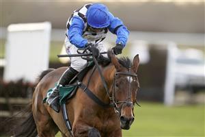 WARWICK, ENGLAND - FEBRUARY 03: Harry Skelton riding Supremely Lucky clear the last to win The Visit racingtv.com Handicap Hurdle at Warwick Racecourse on February 03, 2021 in Warwick, England. Due to the Coronavirus pandemic, owners along with the paying public will not be allowed to attend the meeting. (Photo by Alan Crowhurst/Getty Images)