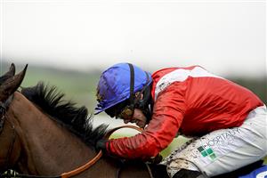 WINCANTON, ENGLAND - FEBRUARY 04: Jonjo O'Neill Jr. riding Rose of Arcadia (red) clear the last to win The EBF Mares' 'National Hunt' Novices' Hurdle at Wincanton Racecourse on February 04, 2021 in Wincanton, England. Due to the Coronavirus pandemic, owners along with the paying public will not be allowed to attend the meeting. (Photo by Alan Crowhurst/Getty Images)