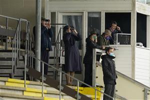WINCANTON, ENGLAND - FEBRUARY 04: Commentator Richard Hoiles with officials at Wincanton Racecourse on February 04, 2021 in Wincanton, England. Due to the Coronavirus pandemic, owners along with the paying public will not be allowed to attend the meeting. (Photo by Alan Crowhurst/Getty Images)
