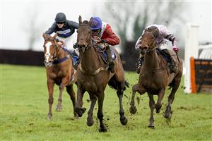 WINCANTON, ENGLAND - FEBRUARY 04: Jonjo O'Neill Jr. riding Rose of Arcadia (red) clear the last to win The EBF Mares' 'National Hunt' Novices' Hurdle at Wincanton Racecourse on February 04, 2021 in Wincanton, England. Due to the Coronavirus pandemic, owners along with the paying public will not be allowed to attend the meeting. (Photo by Alan Crowhurst/Getty Images)