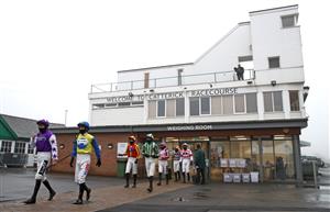 CATTERICK, ENGLAND - FEBRUARY 05: Aidan Coleman and Daryl Jacob lead out the jockeys ahead of the Millbry Hill Juvenile Hurdle race at Catterick Racecourse on February 5, 2021 in Catterick, England. (Photo by Pool/Getty Images)