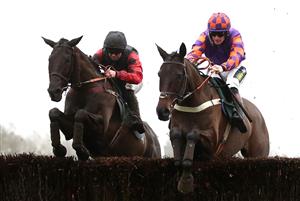 CATTERICK, ENGLAND - FEBRUARY 05: Quick Wave ridden by jockey Robert Dunne (left) on their way to winning the Meetings That Matter On Racing TV Mares' Handicap Chase ahead of Whatsdastory ridden by jockey Sam Twiston-Davies at Catterick Racecourseon February 5, 2021 in Catterick, England. (Photo by Tim Goode - Pool / Getty Images)