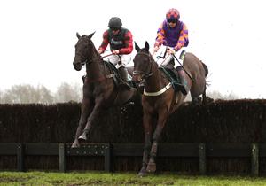 CATTERICK, ENGLAND - FEBRUARY 05: Quick Wave ridden by jockey Robert Dunne (left) on their way to winning the Meetings That Matter On Racing TV Mares' Handicap Chase ahead of Whatsdastory ridden by jockey Sam Twiston-Davies at Catterick Racecourseon February 5, 2021 in Catterick, England. (Photo by Tim Goode - Pool / Getty Images)