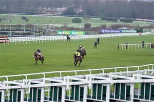 ESHER, ENGLAND - FEBRUARY 06: Joshua Moore riding High Up In The Air (L) win The Virgin Bet Novices' Limited Handicap Chase at Sandown Park Racecourse on February 06, 2021 in Esher, England. Due to the Coronavirus pandemic, owners along with the paying public will not be allowed to attend the meeting. (Photo by Alan Crowhurst/Getty Images)