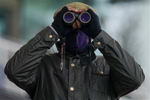 ESHER, ENGLAND - FEBRUARY 06: Watching the action at Sandown Park Racecourse on February 06, 2021 in Esher, England. Due to the Coronavirus pandemic, owners along with the paying public will not be allowed to attend the meeting. (Photo by Alan Crowhurst/Getty Images)