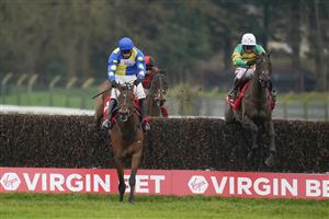 ESHER, ENGLAND - FEBRUARY 06: Richard Johnson riding Sporting John (green) clear the last to win The Virgin Bet Scilly Isles Novices' Chase from Shan Blue and Harry Skelton at Sandown Park Racecourse on February 06, 2021 in Esher, England. Due to the Coronavirus pandemic, owners along with the paying public will not be allowed to attend the meeting. (Photo by Alan Crowhurst/Getty Images)