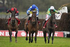 ESHER, ENGLAND - FEBRUARY 06: Richard Johnson riding Sporting John (green) clear the last to win The Virgin Bet Scilly Isles Novices' Chase from Shan Blue and Harry Skelton at Sandown Park Racecourse on February 06, 2021 in Esher, England. Due to the Coronavirus pandemic, owners along with the paying public will not be allowed to attend the meeting. (Photo by Alan Crowhurst/Getty Images)