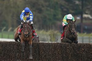 ESHER, ENGLAND - FEBRUARY 06: Richard Johnson riding Sporting John (green) clear the last to win The Virgin Bet Scilly Isles Novices' Chase from Shan Blue and Harry Skelton at Sandown Park Racecourse on February 06, 2021 in Esher, England. Due to the Coronavirus pandemic, owners along with the paying public will not be allowed to attend the meeting. (Photo by Alan Crowhurst/Getty Images)