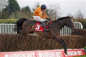 ESHER, ENGLAND - FEBRUARY 06: Harry Skelton riding Alnadam clear the last to win The Virgin Bet Warriors Handicap Chase at Sandown Park Racecourse on February 06, 2021 in Esher, England. Due to the Coronavirus pandemic, owners along with the paying public will not be allowed to attend the meeting. (Photo by Alan Crowhurst/Getty Images)