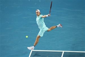 MELBOURNE, AUSTRALIA - FEBRUARY 08: Denis Shapovalov of Canada plays a backhand during his Men