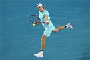 MELBOURNE, AUSTRALIA - FEBRUARY 08: Denis Shapovalov of Canada plays a backhand during his Men