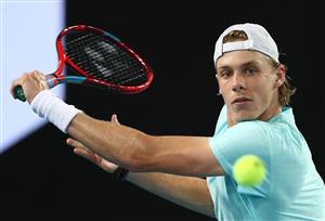 MELBOURNE, AUSTRALIA - FEBRUARY 08: Denis Shapovalov of Canada plays a backhand during his Men
