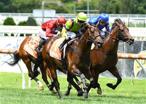MELBOURNE, AUSTRALIA - FEBRUARY 06: Jamie Kah riding General Beau defeats Damien Oliver riding Anamoe in Race 3, the Neds Blue Diamond Prelude C&g, during C.F. Orr Stakes Day at Caulfield Racecourse on February 06, 2021 in Melbourne, Australia. (Photo by Vince Caligiuri/Getty Images)