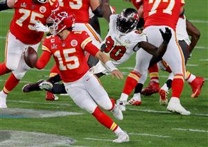 TAMPA, FLORIDA - FEBRUARY 07: Patrick Mahomes #15 of the Kansas City Chiefs eludes pressure in the fourth quarter against the Tampa Bay Buccaneers in Super Bowl LV at Raymond James Stadium on February 07, 2021 in Tampa, Florida. (Photo by Kevin C. Cox/Getty Images)