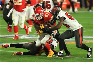 TAMPA, FLORIDA - FEBRUARY 07: Jason Pierre-Paul #90 and Lavonte David #54 of the Tampa Bay Buccaneers tackles Travis Kelce #87 of the Kansas City Chiefs during the second quarter in Super Bowl LV at Raymond James Stadium on February 07, 2021 in Tampa, Florida. (Photo by Mike Ehrmann/Getty Images)