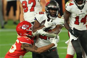 TAMPA, FLORIDA - FEBRUARY 07: Leonard Fournette #28 of the Tampa Bay Buccaneers rushes during the fourth quarter against the Kansas City Chiefs in Super Bowl LV at Raymond James Stadium on February 07, 2021 in Tampa, Florida. (Photo by Mike Ehrmann/Getty Images)