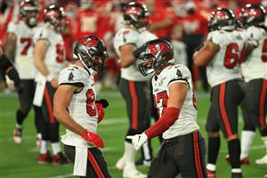 TAMPA, FLORIDA - FEBRUARY 07: Rob Gronkowski #87 of the Tampa Bay Buccaneers reacts after scoring a 17 yard touchdown with Cameron Brate #84 in the second quarter against the Kansas City Chiefs in Super Bowl LV at Raymond James Stadium on February 07, 2021 in Tampa, Florida. (Photo by Mike Ehrmann/Getty Images)