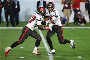 TAMPA, FLORIDA - FEBRUARY 07: Tom Brady #12 of the Tampa Bay Buccaneers hands off to Ronald Jones II #27 during the first quarter against the Kansas City Chiefs in Super Bowl LV at Raymond James Stadium on February 07, 2021 in Tampa, Florida. (Photo by Patrick Smith/Getty Images)