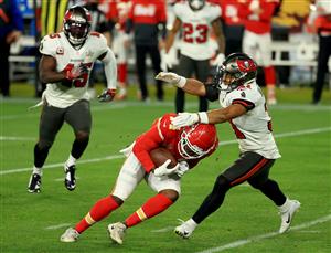 TAMPA, FLORIDA - FEBRUARY 07: Sammy Watkins #14 of the Kansas City Chiefs is tackled by Antoine Winfield Jr. #31 of the Tampa Bay Buccaneers in the third quarter in Super Bowl LV at Raymond James Stadium on February 07, 2021 in Tampa, Florida. (Photo by Mike Ehrmann/Getty Images)