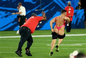 TAMPA, FLORIDA - FEBRUARY 07: A fan runs on the field during the fourth quarter of Super Bowl LV between the Tampa Bay Buccaneers and the Kansas City Chiefs at Raymond James Stadium on February 07, 2021 in Tampa, Florida. (Photo by Mike Ehrmann/Getty Images)