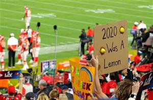TAMPA, FLORIDA - FEBRUARY 07: A fan holds up a sign during the second quarter of the game between the Tampa Bay Buccaneers and the Kansas City Chiefs in Super Bowl LV at Raymond James Stadium on February 07, 2021 in Tampa, Florida. (Photo by Kevin C. Cox/Getty Images)