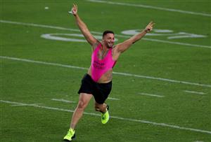 TAMPA, FLORIDA - FEBRUARY 07: A fan runs on the field during the fourth quarter of Super Bowl LV between the Tampa Bay Buccaneers and the Kansas City Chiefs at Raymond James Stadium on February 07, 2021 in Tampa, Florida. (Photo by Kevin C. Cox/Getty Images)