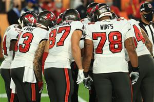 TAMPA, FLORIDA - FEBRUARY 07: The Tampa Bay Buccaneers huddle during the first quarter of a game against the Kansas City Chiefs in Super Bowl LV at Raymond James Stadium on February 07, 2021 in Tampa, Florida. (Photo by Mike Ehrmann/Getty Images)