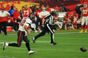 TAMPA, FLORIDA - FEBRUARY 07: Tom Brady #12 of the Tampa Bay Buccaneers chases the ball during the third quarter against the Kansas City Chiefs in Super Bowl LV at Raymond James Stadium on February 07, 2021 in Tampa, Florida. (Photo by Mike Ehrmann/Getty Images)