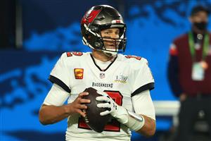 TAMPA, FLORIDA - FEBRUARY 07: Tom Brady #12 of the Tampa Bay Buccaneers looks to pass during the fourth quarter of the game against the Kansas City Chiefs in Super Bowl LV at Raymond James Stadium on February 07, 2021 in Tampa, Florida. (Photo by Mike Ehrmann/Getty Images)