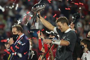 TAMPA, FLORIDA - FEBRUARY 07: Tom Brady #12 of the Tampa Bay Buccaneers hoists the Vince Lombardi Trophy after winning Super Bowl LV at Raymond James Stadium on February 07, 2021 in Tampa, Florida. The Buccaneers defeated the Chiefs 31-9. (Photo by Patrick Smith/Getty Images)