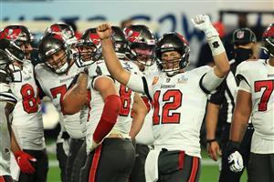 TAMPA, FLORIDA - FEBRUARY 07: Tom Brady #12 of the Tampa Bay Buccaneers reacts with teammates late in the fourth quarter against the Kansas City Chiefs in Super Bowl LV at Raymond James Stadium on February 07, 2021 in Tampa, Florida. (Photo by Mike Ehrmann/Getty Images)