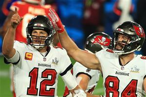 TAMPA, FLORIDA - FEBRUARY 07: Tom Brady #12 of the Tampa Bay Buccaneers reacts after a touchdown in the third quarter against the Kansas City Chiefs in Super Bowl LV at Raymond James Stadium on February 07, 2021 in Tampa, Florida. (Photo by Mike Ehrmann/Getty Images)