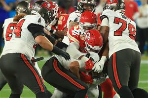 TAMPA, FLORIDA - FEBRUARY 07: Frank Clark #55 of the Kansas City Chiefs sacks Tom Brady #12 of the Tampa Bay Buccaneers in the first quarter in Super Bowl LV at Raymond James Stadium on February 07, 2021 in Tampa, Florida. (Photo by Mike Ehrmann/Getty Images)