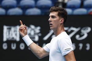 MELBOURNE, AUSTRALIA - FEBRUARY 11: Thanasi Kokkinakis of Australia celebrates after winning the first set in his Men