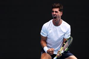 MELBOURNE, AUSTRALIA - FEBRUARY 11: Thanasi Kokkinakis of Australia celebrates after winning the fourth set in his Men