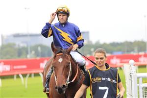 SYDNEY, AUSTRALIA - FEBRUARY 13: Tommy Berry on Masked Crusader returns to scale after winning race 6 the Cellarbrations Southern Cross Stakes during Sydney Racing at Royal Randwick Racecourse on February 13, 2021 in Sydney, Australia. (Photo by Mark Evans/Getty Images)