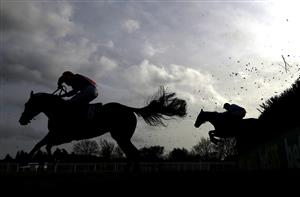 WETHERBY, ENGLAND - FEBRUARY 17: A general view of runners and riders in action as they compete in the Sixt Car Hire Handicap Chase at Wetherby Racecourse on February 17, 2021 in Wetherby, England. (Photo by Tim Goode - Pool/Getty Images)