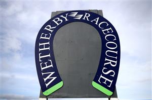 WETHERBY, ENGLAND - FEBRUARY 17: A general view of signage at Wetherby Racecourse at Wetherby Racecourse on February 17, 2021 in Wetherby, England. (Photo by Pool/Getty Images)