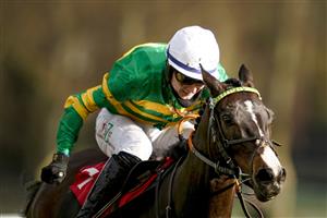 ESHER, ENGLAND - FEBRUARY 18: Niall Houlihan riding Belargus clear the last to win The Elmbridge Handicap Chase at Sandown Park Racecourse on February 18, 2021 in Esher, England. Due to the coronavirus pandemic, owners along with the paying public will not be allowed to attend the meeting. (Photo by Alan Crowhurst/Getty Images)